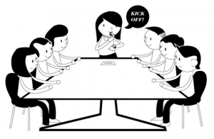Ilustración de seis personas sentadas alrededor de una mesa, con una de pie y diciendo "¡Patada inicial!".